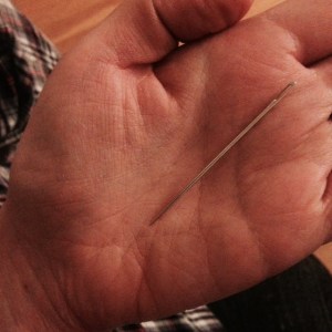 Image of yarn needle for dramatic effect.